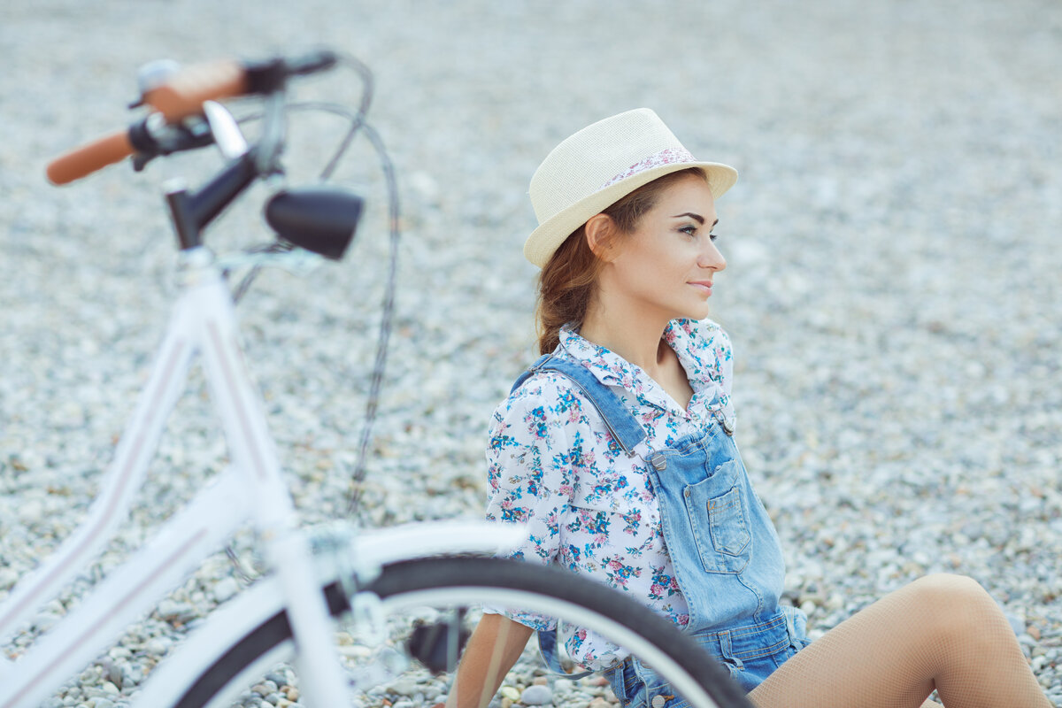 beautiful-woman-with-bycicle-on-the-beach-p9t7tn3.jpg